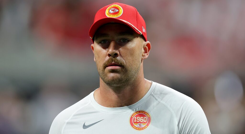 Travis Kelce looks on during warmups.