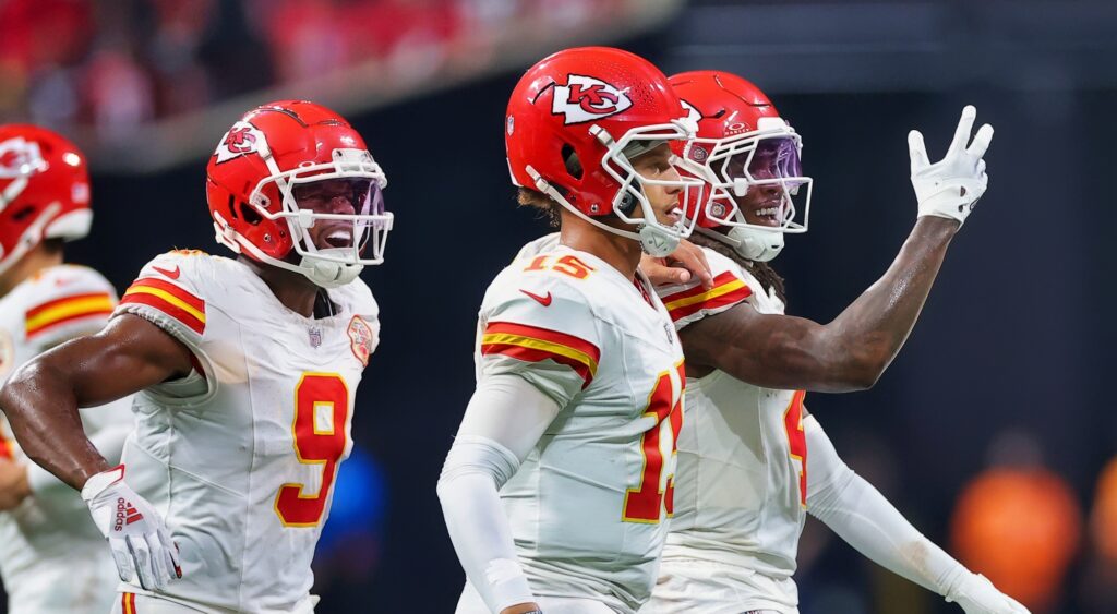 Rashee Rice, Patrick Mahomes and JuJu Smith-Schuster celebrating.