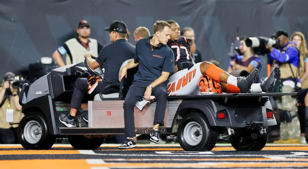 Trent Brown walks off the field.