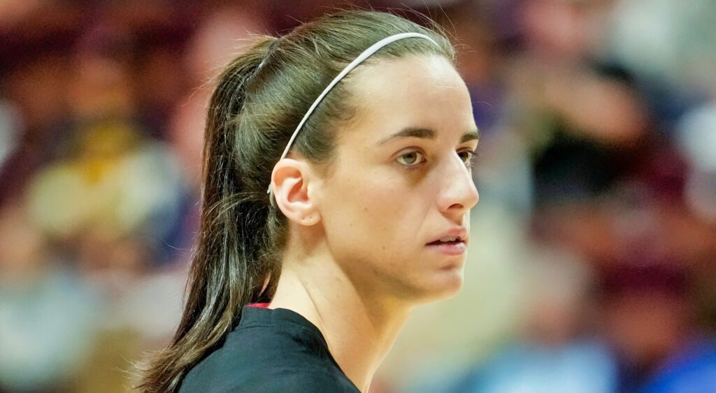 Caitlin Clark looks on during warmups.