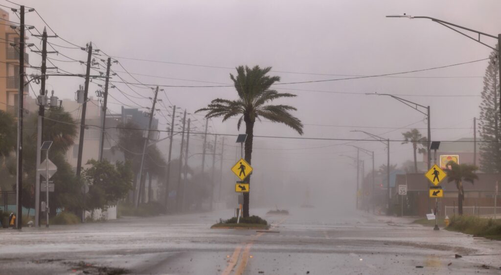 Hurricane Helene rips through a city street.