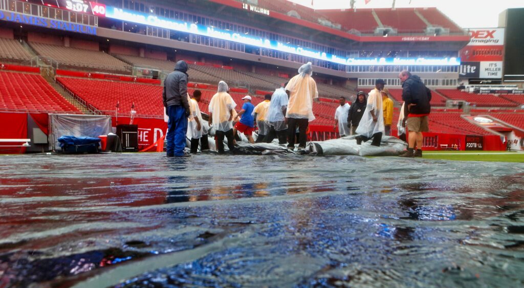 Tampa Bay Buccaneers' home stadium during a rain storm.