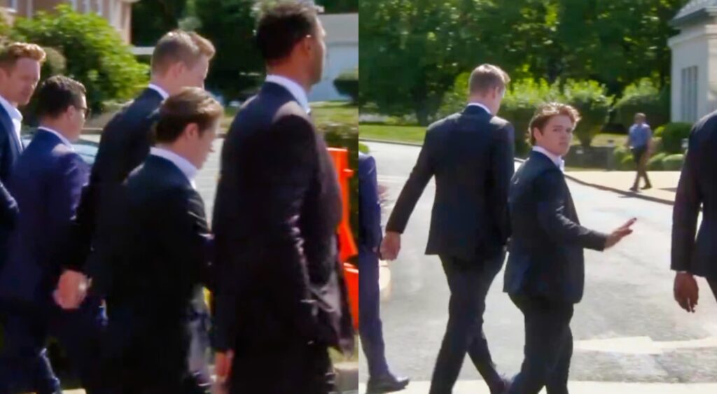 Attendants walking into Matthew and Johnny Guadreau's funeral