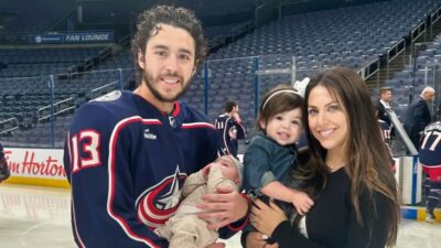 Johnny Gaudreau posing with wife and kids