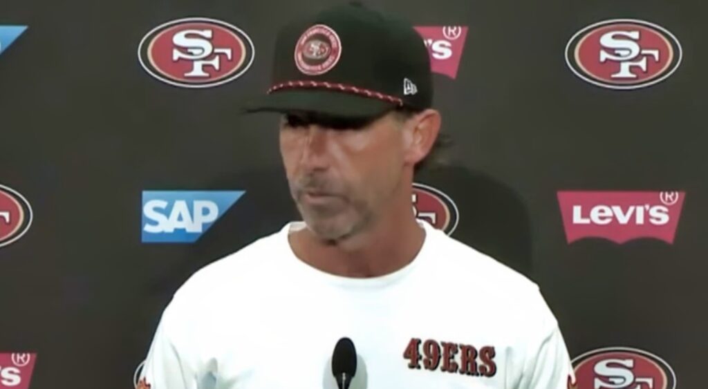 Kyle Shanahan speaking to reporters