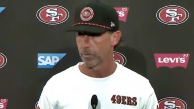 Kyle Shanahan speaking to reporters