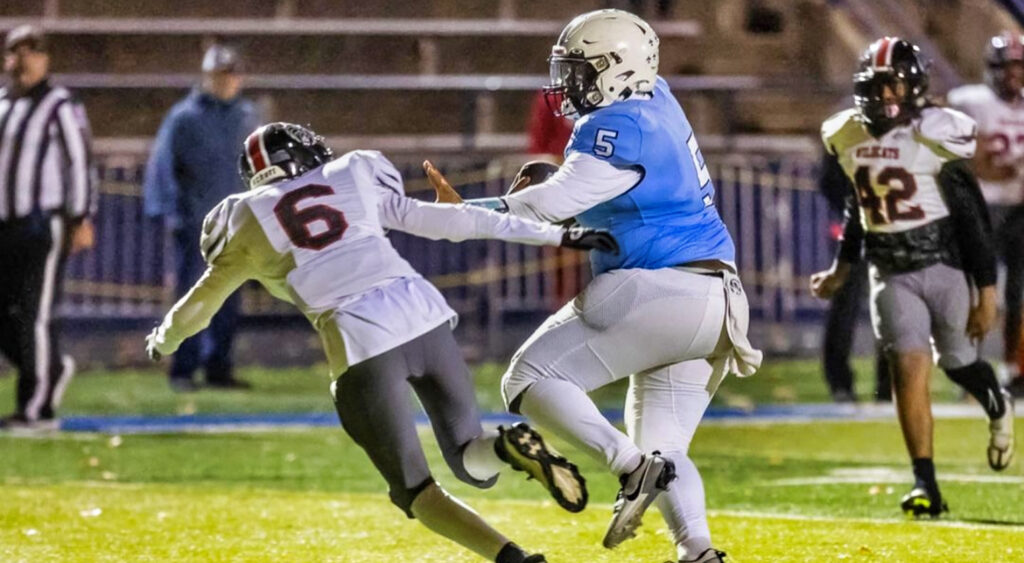 Kyren Eleby running with football