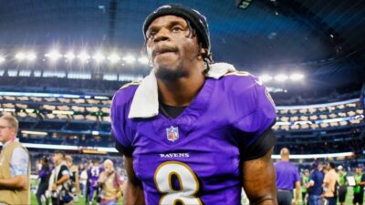 Lamar Jackson leaves the field after winning.