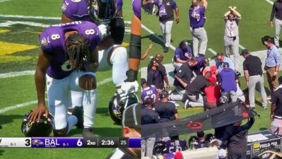 Lamar Jackson and Ravens players kneeling