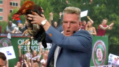 Pat McAfee holding a rooster