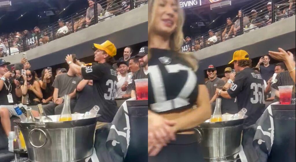 Raiders fans partying in the club seats during a game.