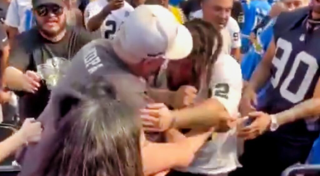 Raiders and Chargers fans fighting in stands