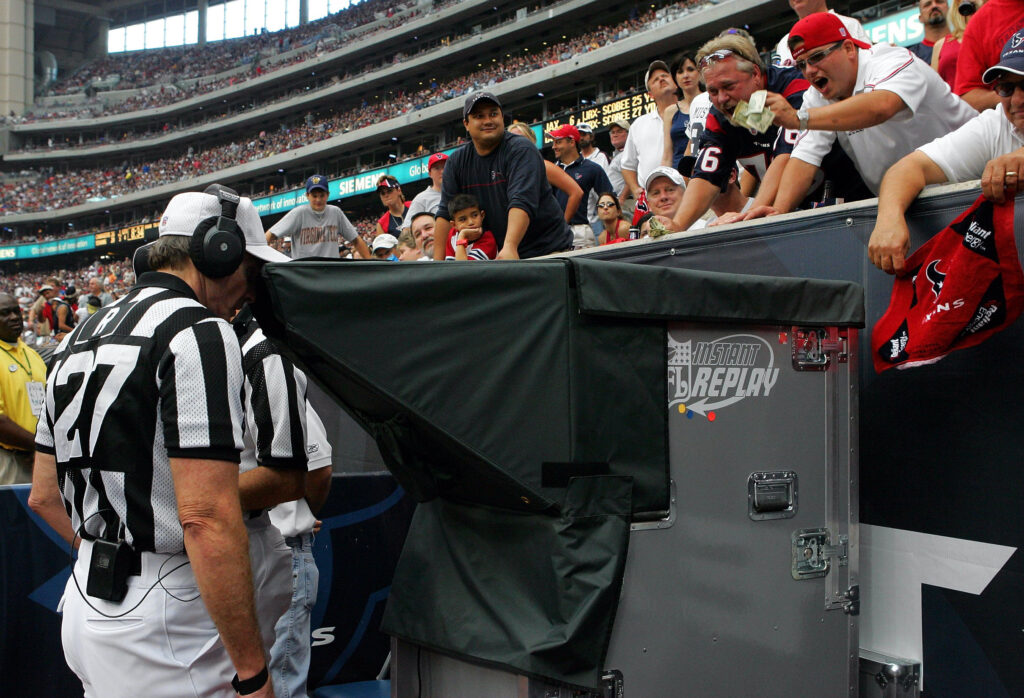 Referee watching a replay