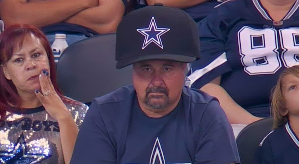 Sad Dallas Cowboys fan in big cap