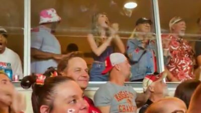 Taylor Swift cheering in suite