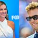 Tom Brady in suit and Erin Andrews posing in dress