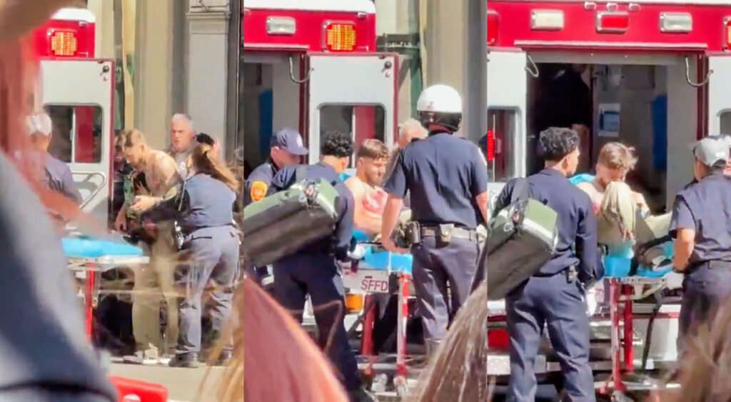 Medical personnel escorting Ricky Pearsall of San Francisco 49ers to ambulance.