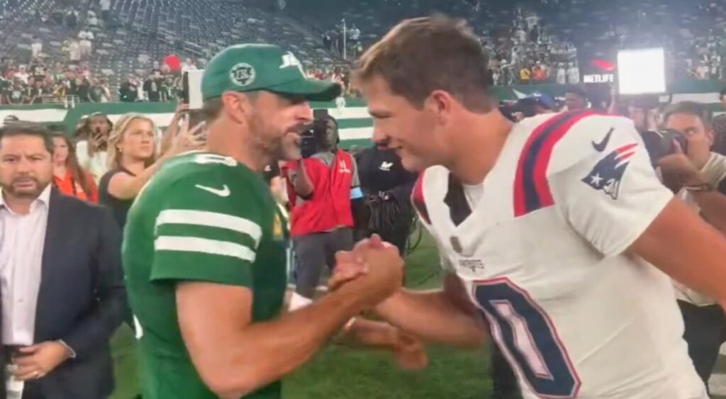 Aaron Rodgers and Drake Maye talking after Patriots-Jets game.