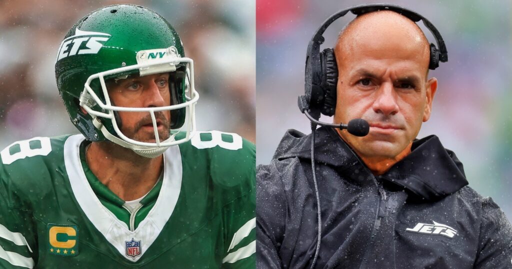 Aaron Rodgers looking on (left) during New Yok Jets game. Robert Saleh (right) looking on.