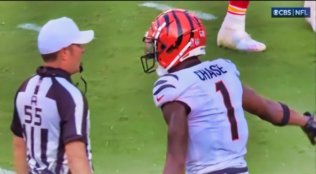 Alex Kemp and Ja'Marr Chase speaking during Bengals-Chiefs game.