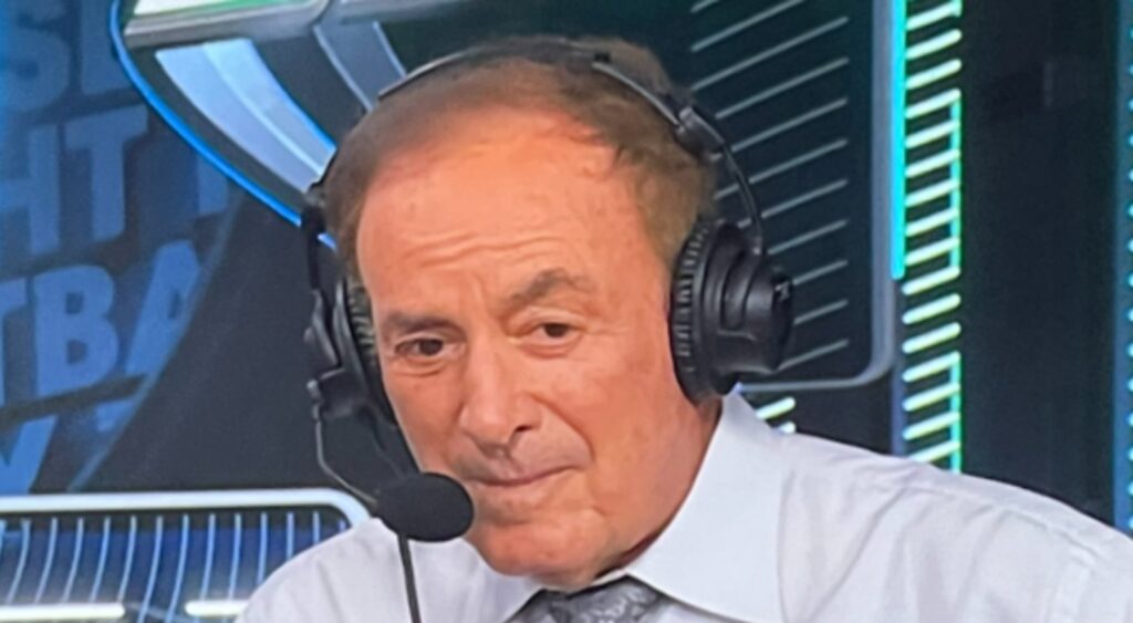 Al Michaels speaking in "Thursday Night Football" broadcast booth.