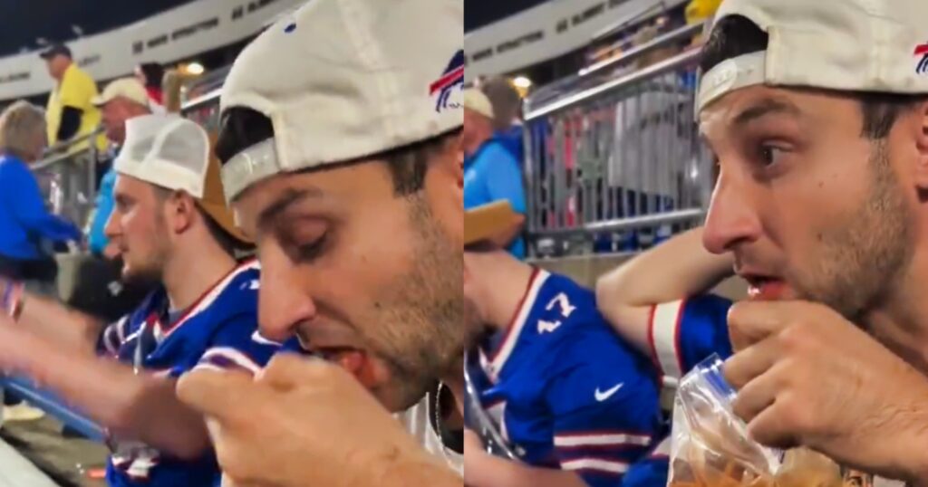 Buffalo Bills fan eating spaghetti at Highmark Stadium.