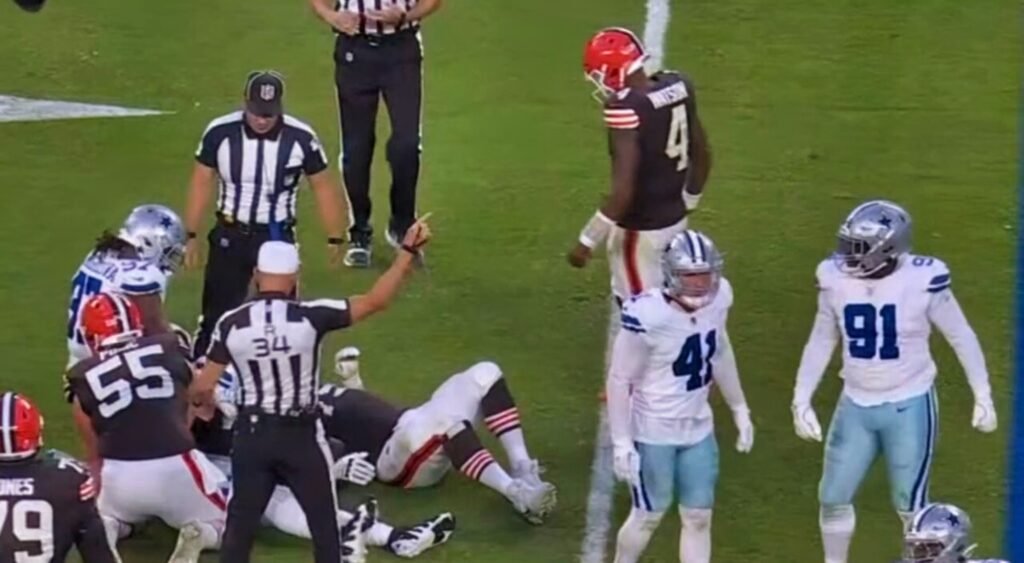 Deshaun Watson looking on in Cleveland Browns anD Dallas Cowboys game.