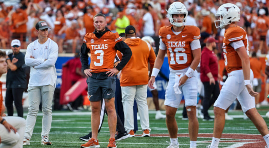 Quinn Ewers standing next to Arch Manning