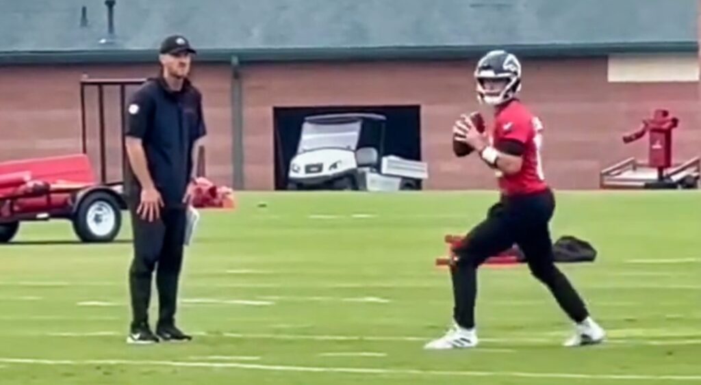 Kirk Cousins of Atlanta Falcons preparing to throw football in practice.