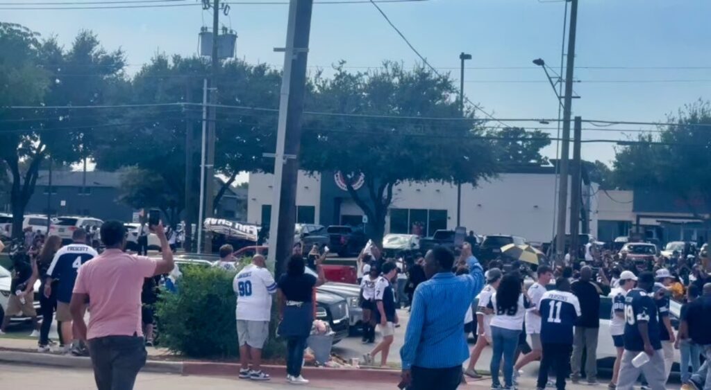 New Orleans Saints and Dallas Cowboys fans seen outside AT&T Stadium.