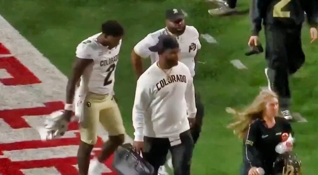 Shedeur Sanders of Colorado Buffaloes walking off field.