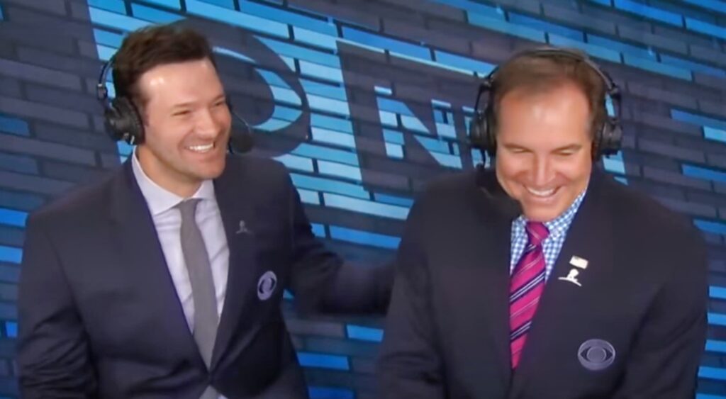 Tony Romo and Jim Nantz speaking in CBS broadcast booth.