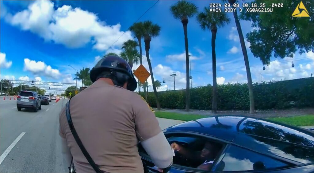 Tyreek Hill of Miami Dolphins being pulled over by police officer.