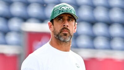 Aaron Rodgers of the New York Jets looks on prior to the 2023 Pro Hall of Fame Game