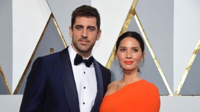 Aaron Rodgers and actress Olivia Munn arrive on the red carpet for the 88th Oscars