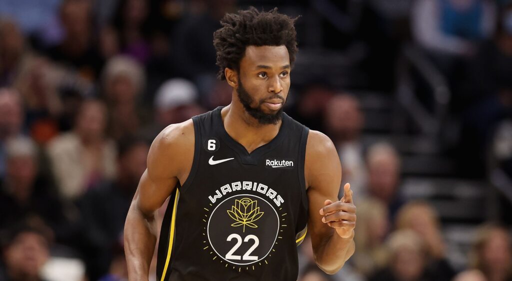 Andrew Wiggins of the Golden State Warriors reacts after a three-point shot