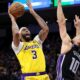 Anthony Davis of the Los Angeles Lakers goes up for a shot on Domantas Sabonis of the Sacramento Kings