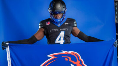 Bol Bol holding Boise State flag