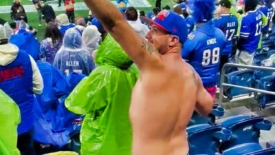 Buffalo Bills fan with no shirt in stands