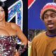 Cardi B posing and making kissy face and Stefon Diggs sticking tongue out