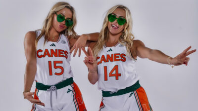 The Cavinder Twins in Miami uniforms