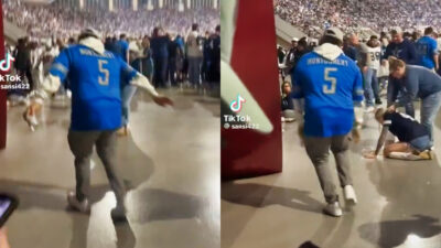 Photos of Detroit Lion fan dancing while Dallas Cowboys fan vomits