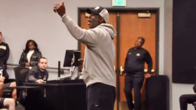 Deion Sanders speaking to Colorado players