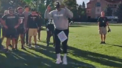 Deion Sanders speaking to Colorado players