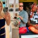 Deshaun Watson on cart and Kelly Stafford posing in mirror