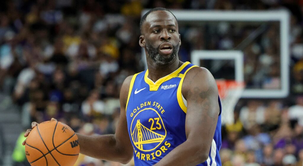 Draymond Green of the Golden State Warriors brings the ball up the court against the Los Angeles Lakers