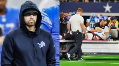 Eminem on Lions sideline in hoodie and Aidan Hutchinson on cart