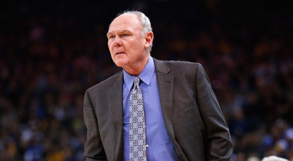 Head coach George Karl stands on the side of the court