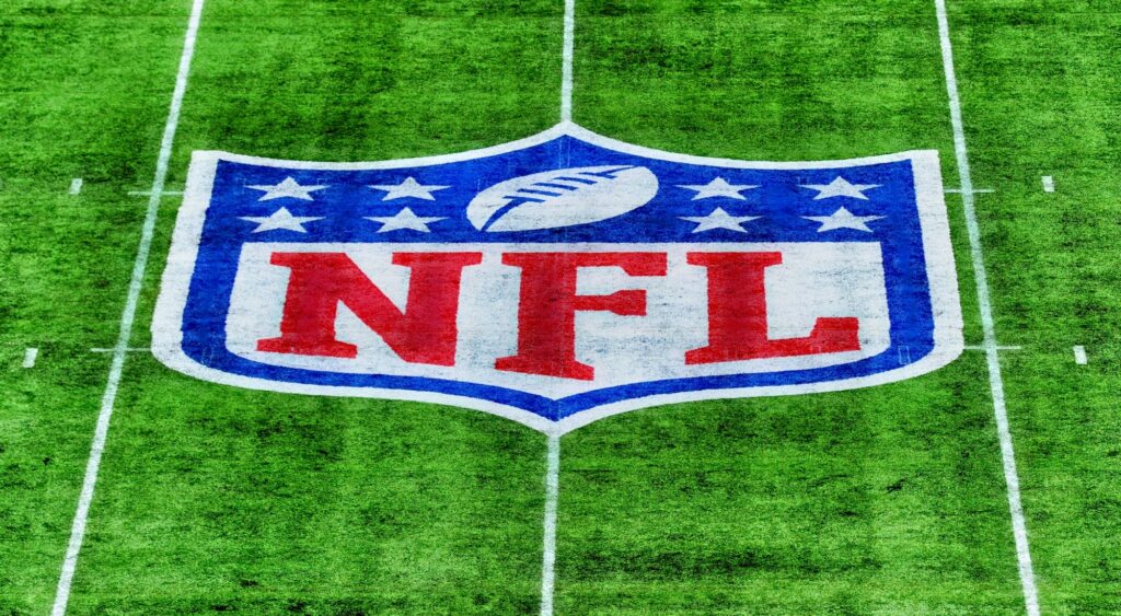 NFL logo shown on field. Jerod Mayo will reportedly be dismissed by the Patriots.