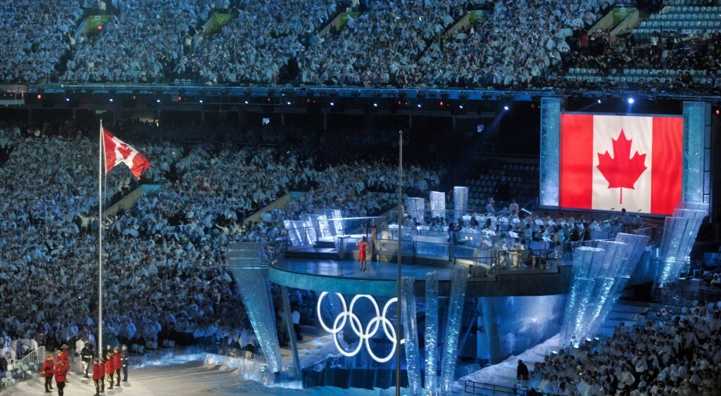 Canada flags at the Olympics. Canadian snowboarder Ryan Wedding is wanted by the FBI.